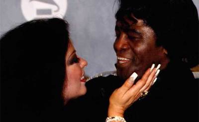 James Brown and wife Adrienne Lois Rodriguez at Grammy Awards.