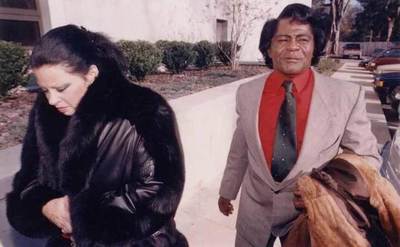 Brown and Rodriguez walk down the street.