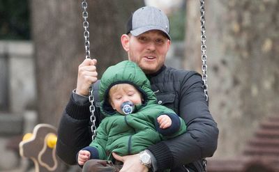 Michael Buble is on the swing with his son Noah.