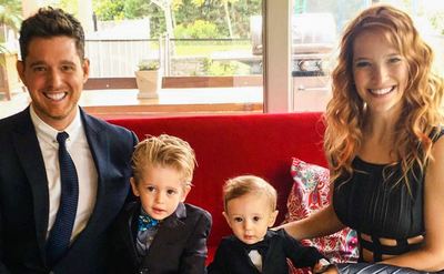 Michael Buble poses with his family at home.