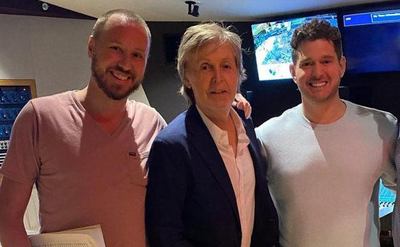 Michael Buble poses with Paul McCartney.