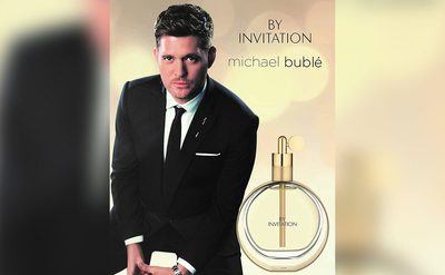 An ad for By Invitation with Michael Buble.