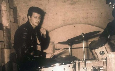Pete Best behind the drums