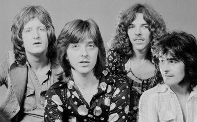A studio portrait of Badfinger.