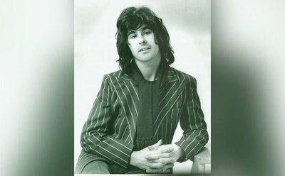 A portrait of Tom Evans.