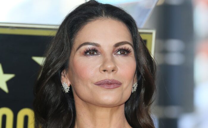 Catherine Zeta-Jones poses for the press.