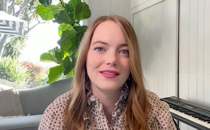 A portrait of Emma Stone at home.
