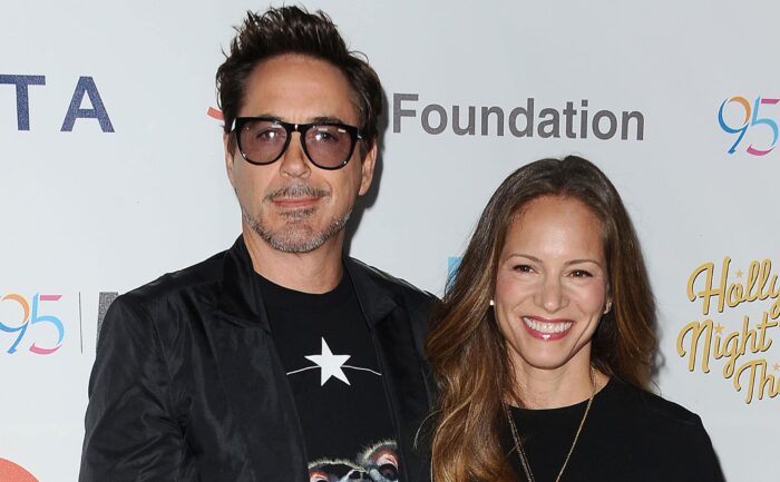 Robert Downey Jr. and Susan Levin pose for the press.