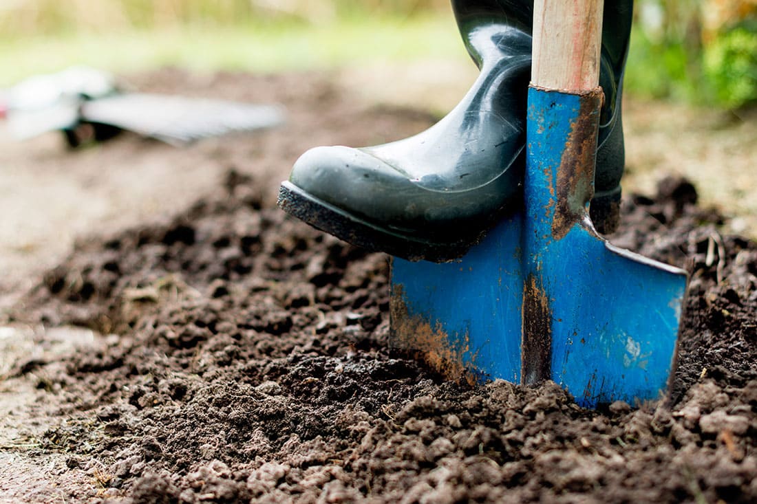 Man digging in the soil