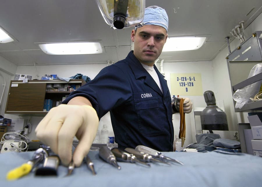 Grabbing a dental tool on an aircraft carrier