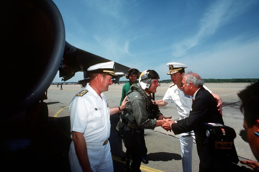 Commanders shaking pilots hand