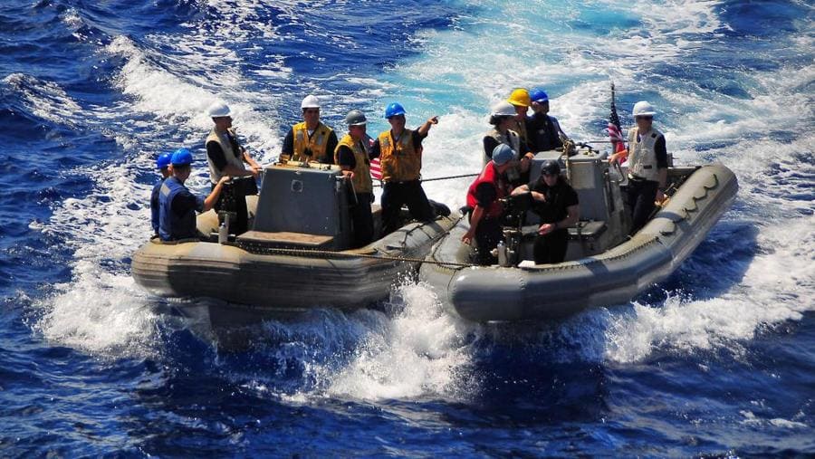Navy comrades on small boats