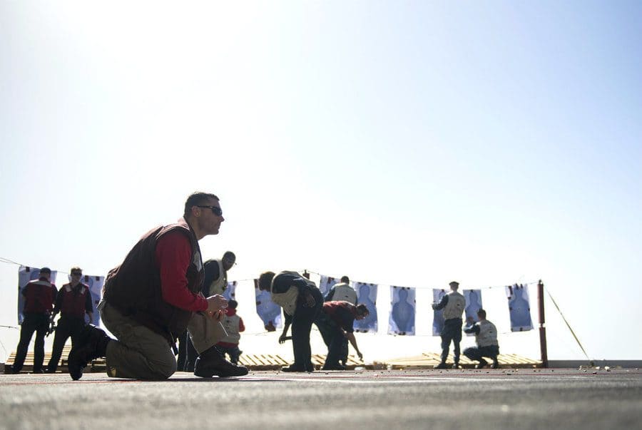 Picking up shells of the floor on an aircraft carrier