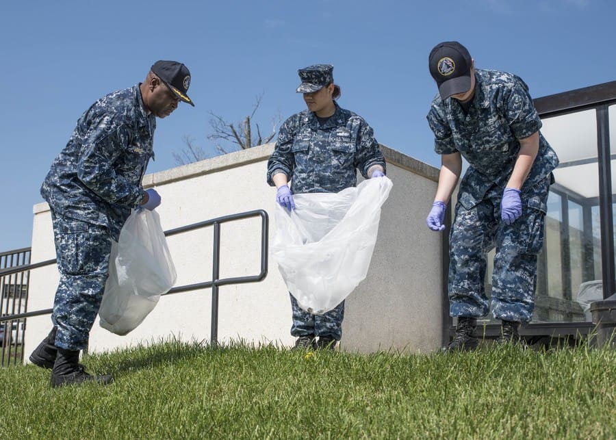 Navy cleaning garbage