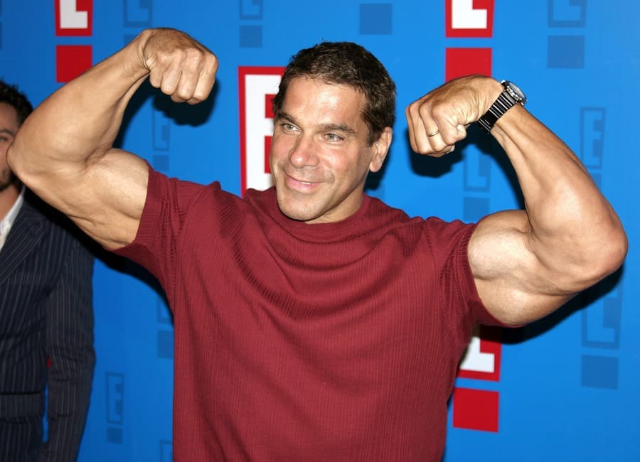 Lou Ferringo flexing his muscles at E! Entertainment Television's summer splash event in 2005.