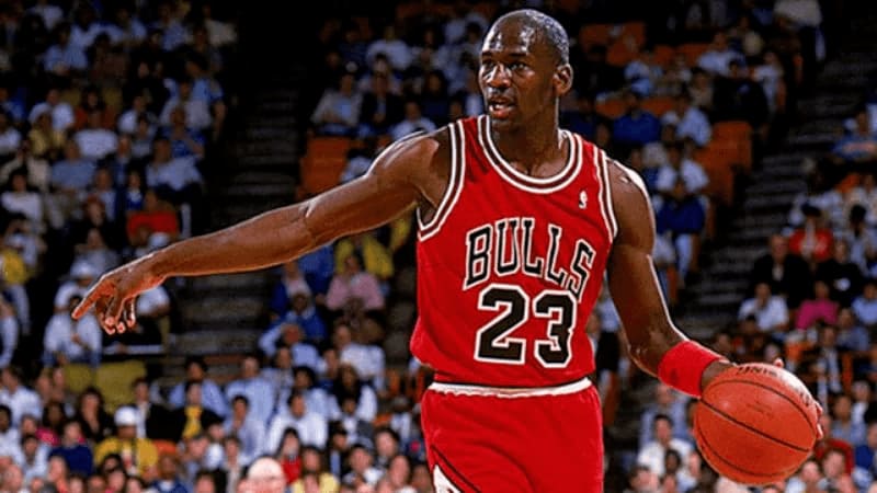 Photograph of Michael Jordon playing for the Chicago Bulls, number 23. 