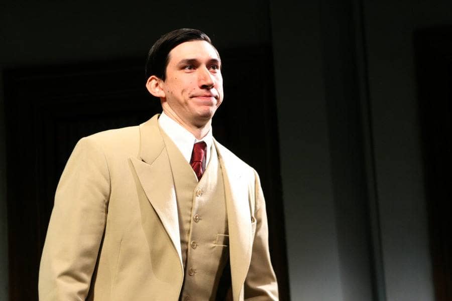 Adam Driver wearing a tan suit and acting in Mrs. Warrens Profession play on opening night.