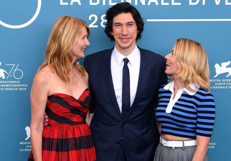 Adam Driver with Laura Dern and Scarlett Johansson at the Marriage Story photocall laughing together.