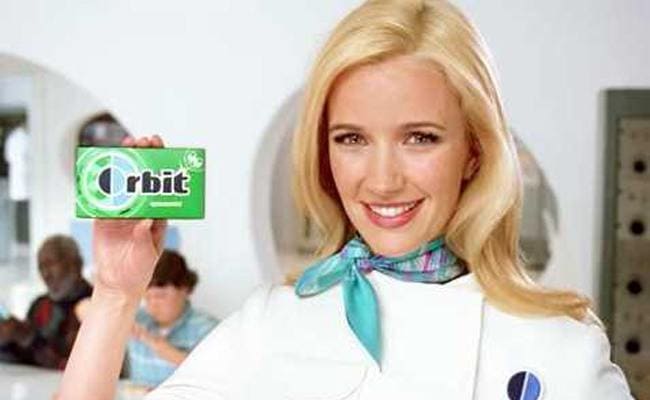 Vanessa dressed in white as the Orbit Gum Girl.
