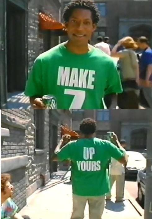 The 7 up guy, whose shirt says Make 7 on the front and Up Yours on the back.