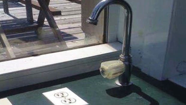 A faucet directed to an electric outlet