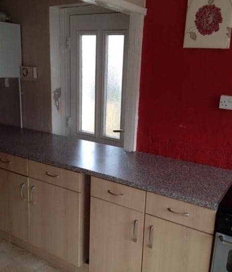 Kitchen cabinets blocking a door entrance