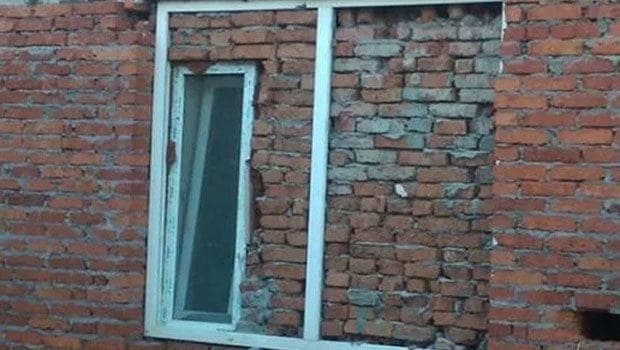 A window blocked by bricks