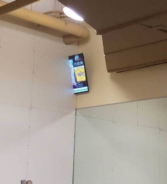 A TV separated by a wall and divided in half