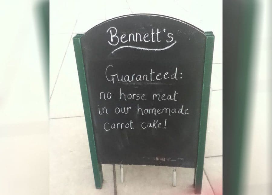 Restaurant sign assuring customers that there is no horse meat in their carrot cake 