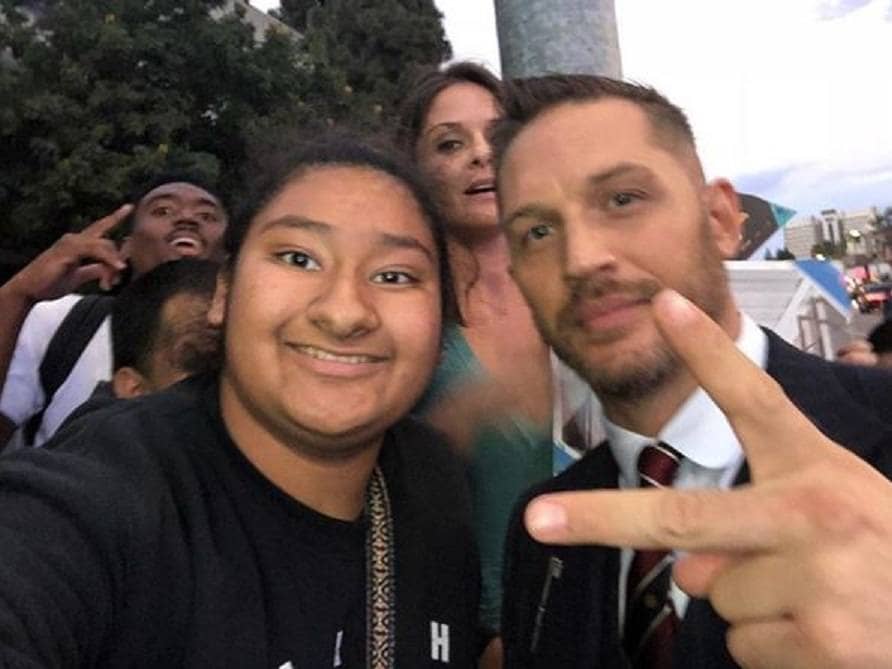 Tom Hardy and Marlen are posing at the Venom film premiere.