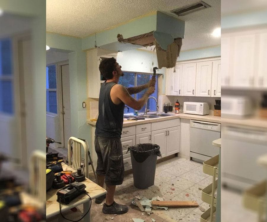 Bobby Kapsidis breaking the kitchen ceiling