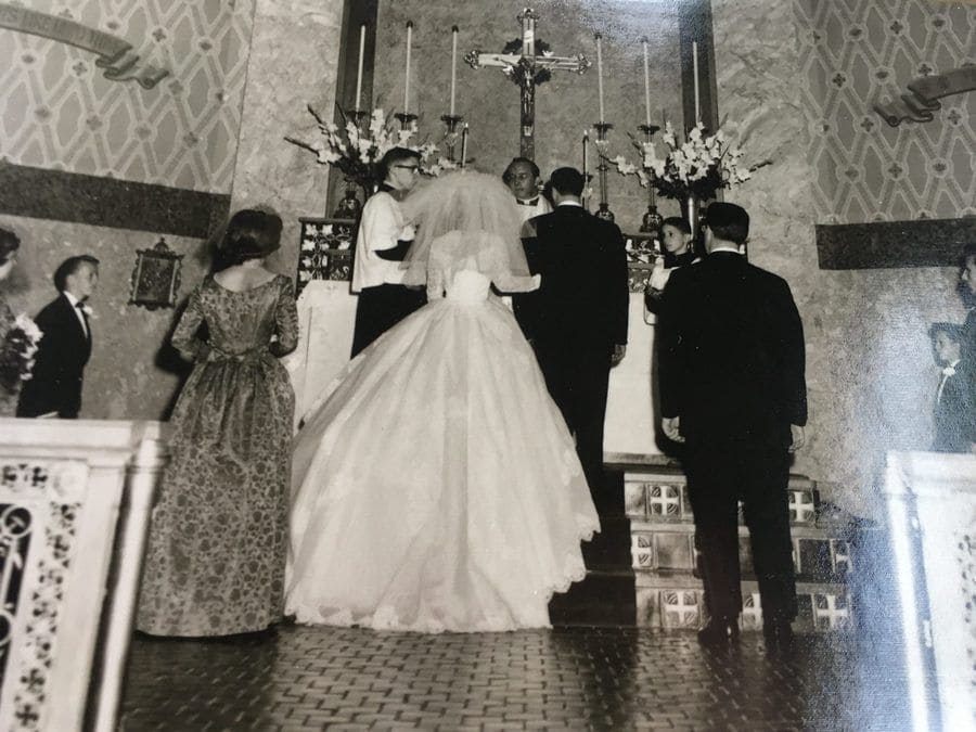 couple getting married at the altar