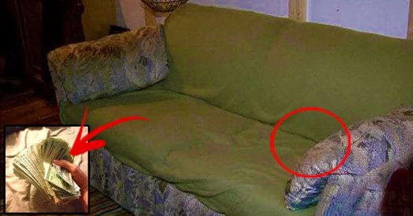 ugly couch taken apart with marks of where money was found