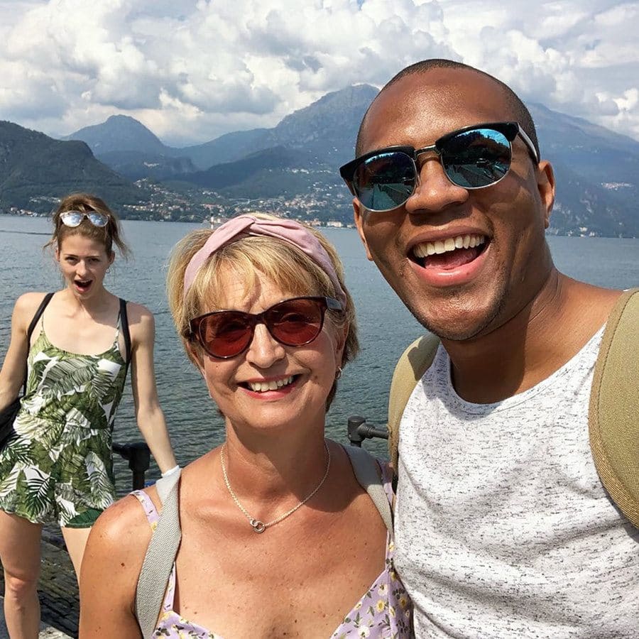 Edi and Cally’s mother are posing on the boat with Cally in the background, looking shocked that she isn’t in the photo.