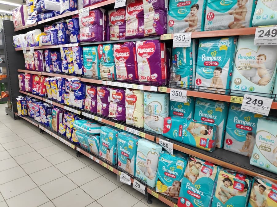 A row of diapers at the supermarket.