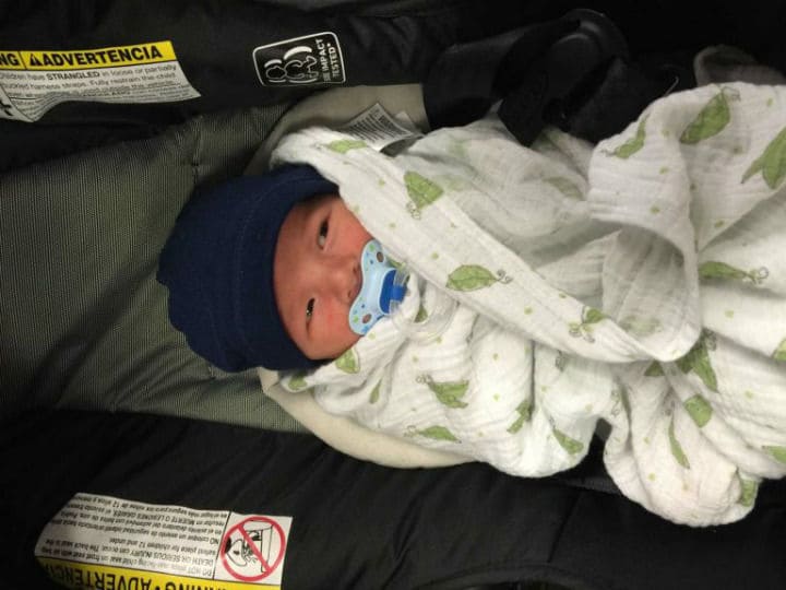 Photo of their baby at 8 days old who needed to be picked up.