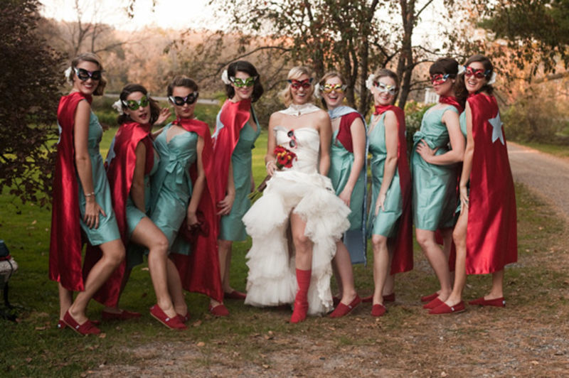 Bride and her bridesmaids in dressed in reed superhero gear! 