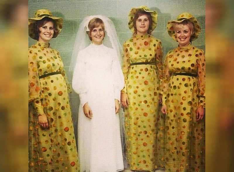 Bridesmaids wearing ugly yellow polka dot dress and a bride 