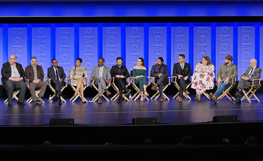 The cast of This Is Us sitting with the writers being interviewed.