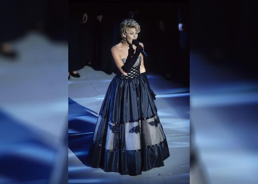 Faith Hill performing on stage in 1996.