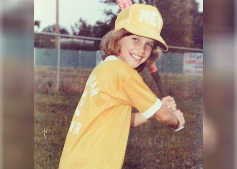 Ten years old Faith Hill with baseball clothes in Mississippi.