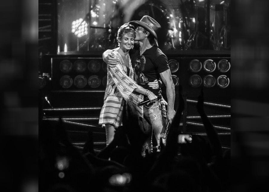 Tim McGraw and Faith Hill hugged together on stage.