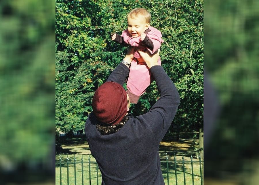 Tim McGraw holding his baby daughter Audrey Caroline.