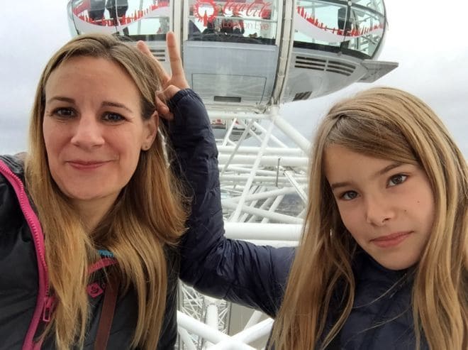 Jessica with her daughter on vacation.