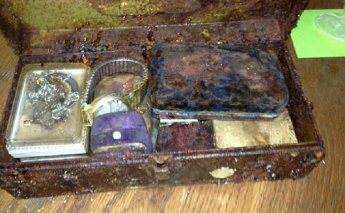 A box with a watch and other old personal items