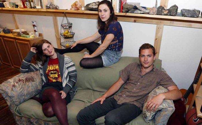 Reese Werkhoven, Cally Guasti, and Lara Russo sitting on a couch