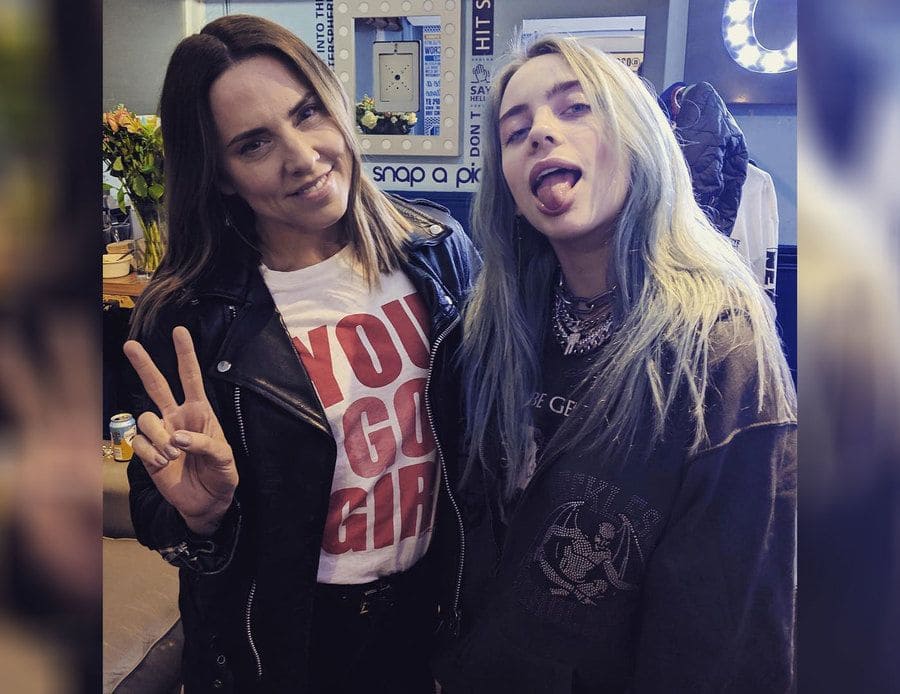 Melanie C (Sporty Spice) and Billie Eilish are backstage at one of her concerts. 