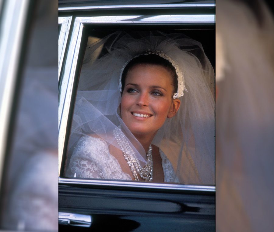 Bo Derek in a wedding dress in the back of a black car from the film ‘Ten.’ 
