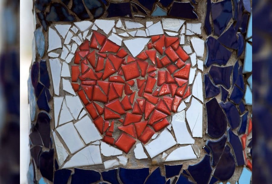 Tiles made into a broken looking heart. 