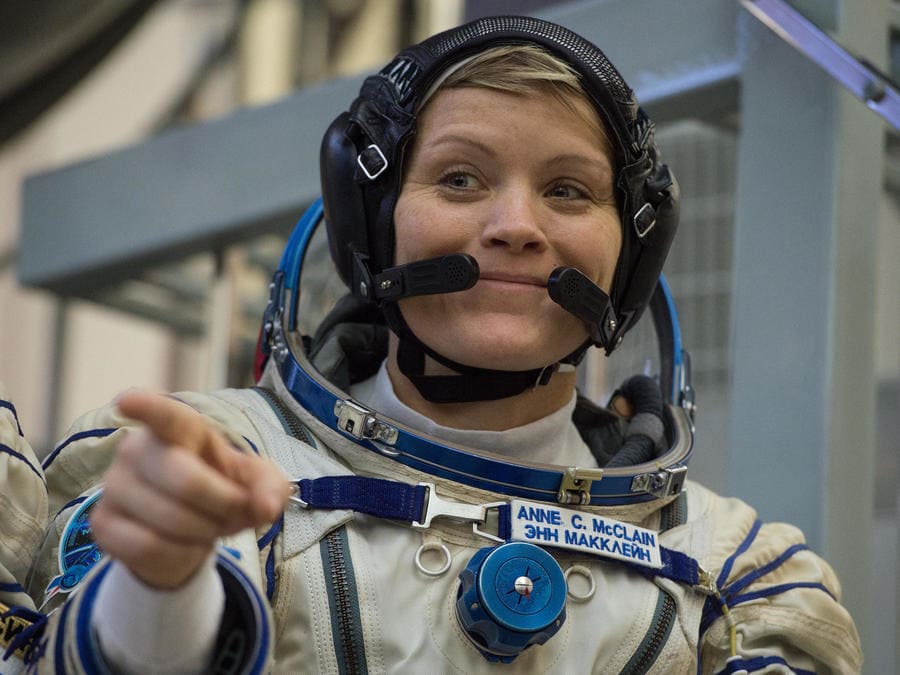 Anne McClain in an Astronaut suit